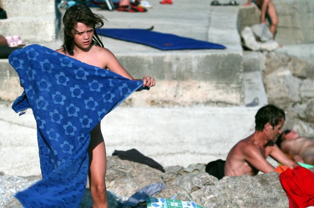 Nudist Rocky Family Angle - Naturism teaches respect and love for the natural world