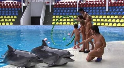 Dolphin Day Delights 1 - Seeks harmony with the rhythms of nature and the environment through nudity