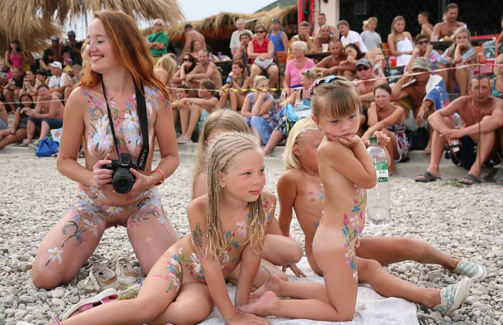 Warm Sand Relaxation photos - Nudism fosters trust and mutual understanding