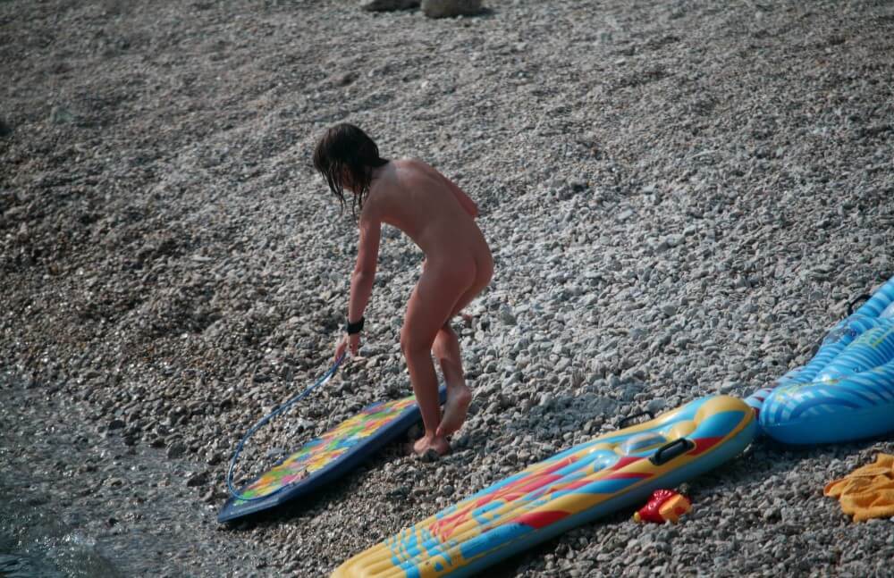 Naturist Surf Board Glides pics - Advocates of naturism and nudism live in harmony with nature