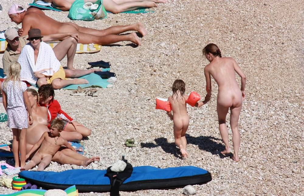 Orange Floaty Safety First Naturist pics - Naturism and Environmental Awareness
