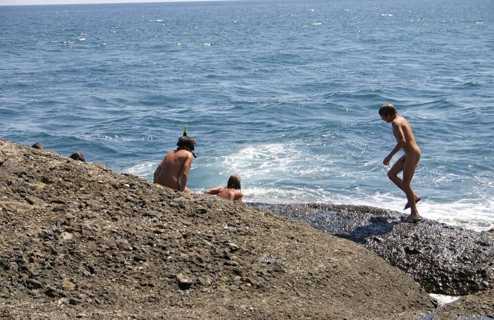 Leaning Against Hit Rocks pics - Nudism and naturism as a philosophy of life based on respect and acceptance